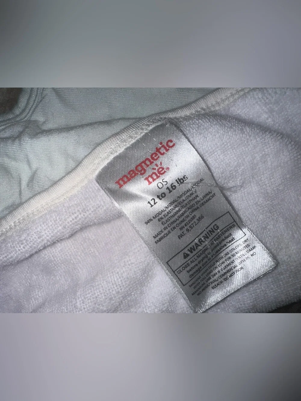 Magnetic Me White Baby Bibs with Red Logo Tag